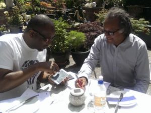 photo of pete and clive working in a garden 